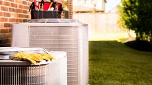 CAM Heating & Cooling | Etowah, NC | residential heating and air units outside a home